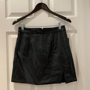 Faux leather mini skirt with small slit